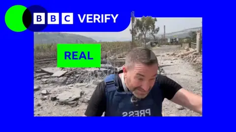A still from a video of a British journalist ducking for cover from an Israeli strike in Lebanon