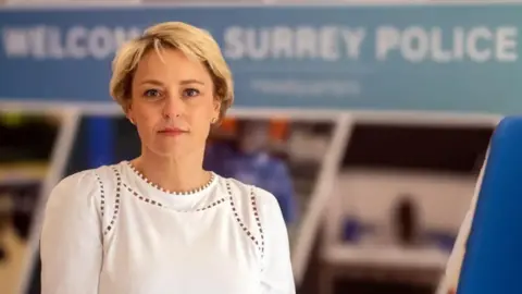 Surrey PCC Lisa Townsend - a woman in a white top with short blonde hair.