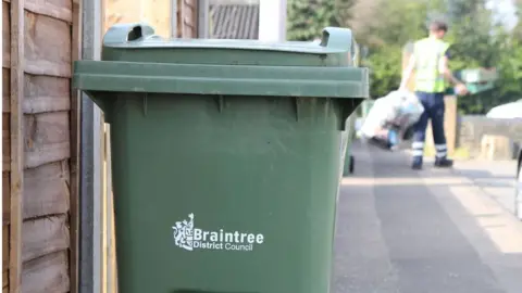 Braintree District Council A green garden waste collection bin