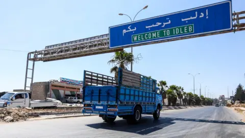 AFP Welcome to Idlib sign