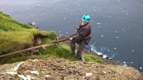 climbing back up the cliff