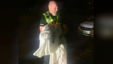 Cambs Police Wallaby with police officer