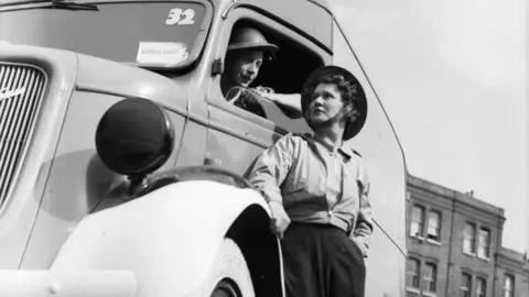Getty Images Two members of the Women's Auxiliary Ambulance Service in Fulham, London.