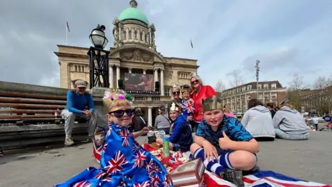 Kevin Shoesmith / BBC Ollie, 9, gives the thumbs up to the Royals at Hull's Queen Victoria Square