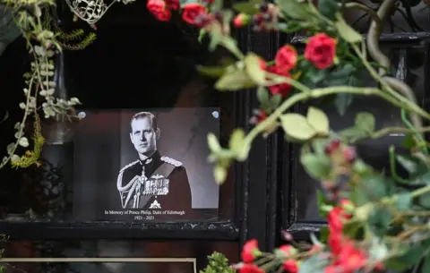 REX / Shutterstock A picture of Britain's Prince Philip, Duke of Edinburgh is placed in a window of a pub near Windsor Castle, Windsor, United Kingdom