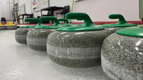 A stone used in curling.