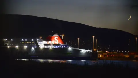 PAcemaker The Superfast VIII ship docked in Belfast on Monday evening, pictured with a thin crescent moon in the sky behind it