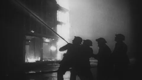 Firefighters were filmed tackling the blaze in May 1941