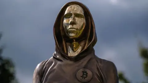 Getty Images A statue of pseudonymous Bitcoin inventor Satoshi Nakamoto in Budapest, Hungary