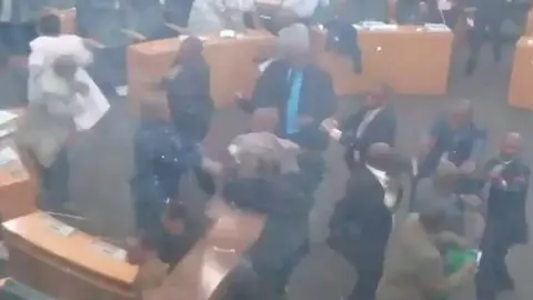 lesotho parliament MPs fighting in parliament