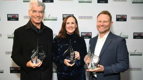 Getty Images Pierce Brosnan, Molly Shannon and Richard Baneham