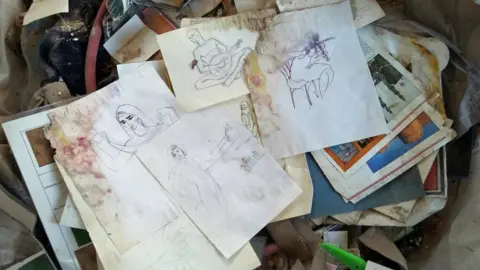 BBC scraps of Zahed's personal belongings - drawings