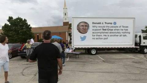 Getty Images A trucks sponsored by a pro-Democrat group features a Trump tweet critical of Mr Cruz