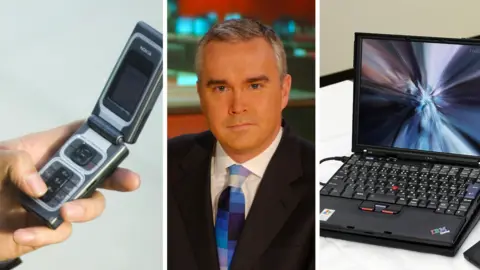 BBC/Getty Images A mobile phone, Huw Edwards and laptop in 2005