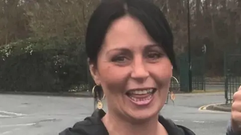 Family handout Tina Robson smiles at the camera