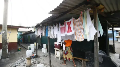 EPA Mr Weah grew up in Monrovia's Gibraltar slum