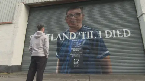 British Heart Foundation Lawrence Shankland looks at his friend's mural