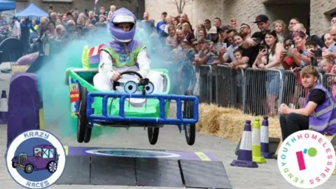 KRAZY RACES A kart lifts off the ground going over a ramp in a previous version of the race.
The kart is made to look like one featured in the film Toy Story.