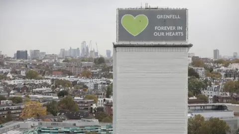 Getty Images A wide   presumption    of what remains of Grenfell Tower covered with hoardings pursuing  a terrible  occurrence  successful  June 2017 connected  October 29, 2019