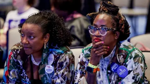 EPA Supporters of US Vice President Kamala Harris watch results of the US 2024 presidential election returns at the close of Georgia Democratic Party election night party in Atlanta, Georgia