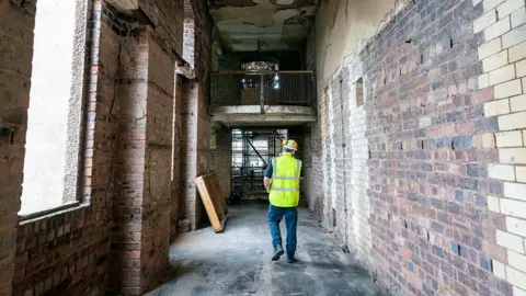 Thousands of tonnes of debris have been removed from the shell of the iconic Mackintosh Building.