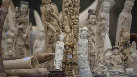 Getty Images Ivory statues about to be destroyed in China (file image)