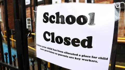 PA Media A 'school closed' sign in Nottingham