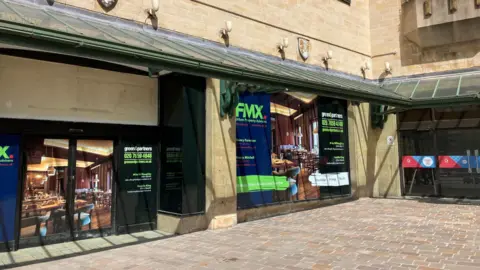 The empty shop, as seen from Market Square