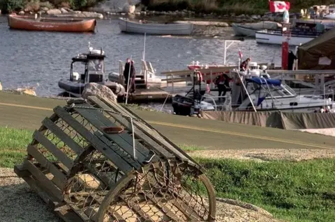 Getty Images Lobster trap in a Nova Scotia harbour