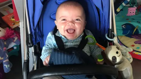 Family photo Gunner in his pram