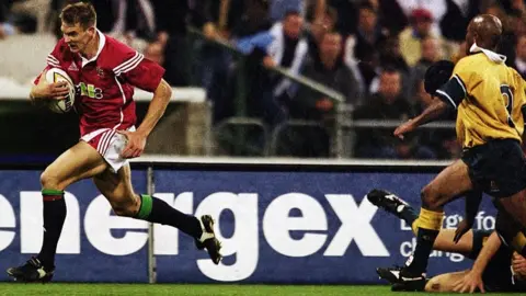 Getty Images Dafydd James runs in a try during the Australia v British and Irish Lions in Brisbane in 2001