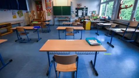 Getty Images How will classrooms look when schools re-open? This is one being prepared in Germany