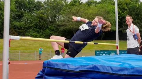 Family handout Wren, from Rutland, competing in the high jump at the British Transplant Games in 2025 in Oxford.
