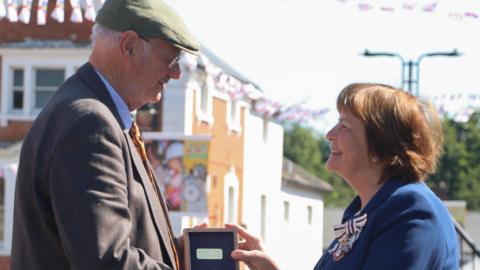 Prof Martin Carver is awarded the Suffolk Medal by Clare, Countess of Euston