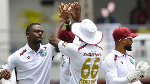 West Indies players celebrate