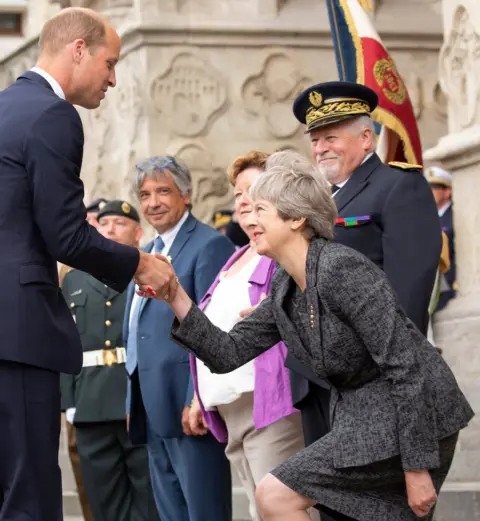 EPA Prince William greets Theresa May as they arrive at the commemoration marking the 100th anniversary of the Battle of Amiens, held at the Amiens Catheral, in Amiens, northern France