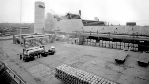 Carlsberg Factory yard, showing pallets of lager and a lorry