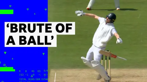 England's Zac Crawley reacts to getting hit on the hand by the ball