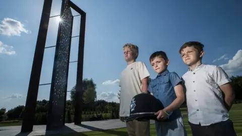 West Midlands Police Harvey (10), Riley (five) and seven-year-old Reggie