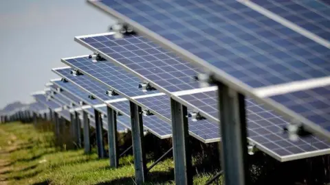 generic solar panels in a field image