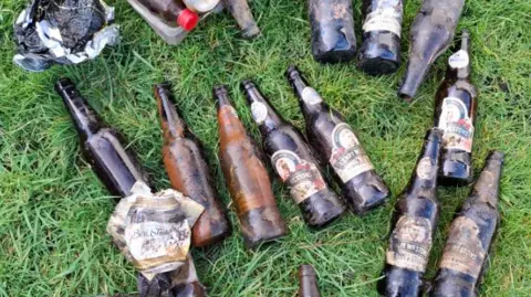 Leicestershire Litter Wombles A collection of dirty old bttles and cans