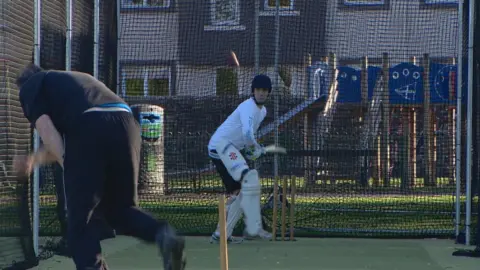 Cricketers in the nets