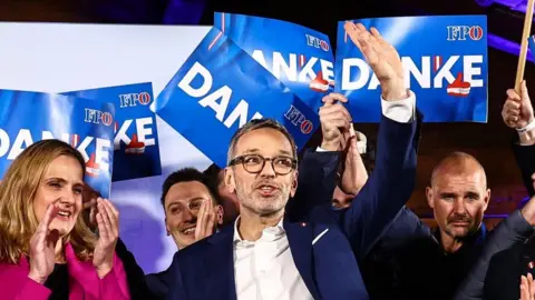 FILIP SINGER/EPA-EFE/REX/Shutterstock Chairman and top candidate of the Freedom Party of Austria (FPOe) Herbert Kickl (center) celebrates during the FPOe election rally after the parliamentary elections in Vienna, Austria, September 29, 2024