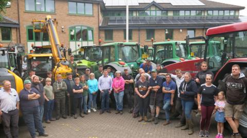 Farmers stood by their tractors at the Forest of Dean District Council offices in Coleford