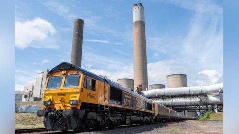 Coal train in front of power station