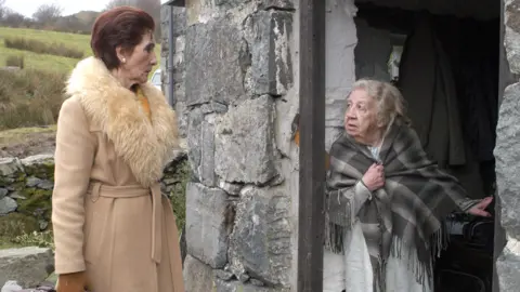 June Brown as Dot Cotton