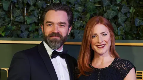 Getty Images Hadley Fraser with his wife Rosalie Craig