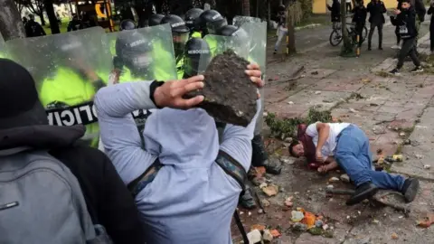 EPA Demonstrators clash with the police during a protest organized in reaction to the death of lawyer Javier Ordonez, in Bogota, Colombia, 09 September 2020.