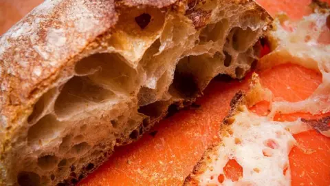 Getty Images A picture of a slice of bread