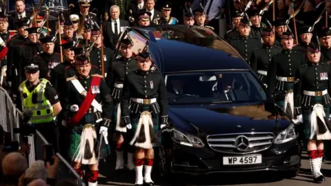 Getty Images Duke of York following coffin up Royal Mile